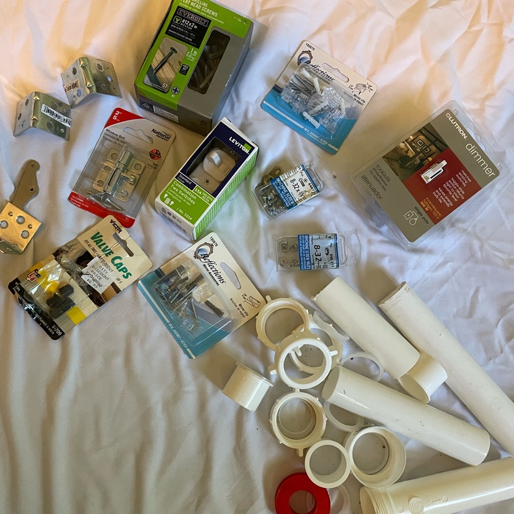Assorted Hardware and Plumbing Supplies screws light switch etc